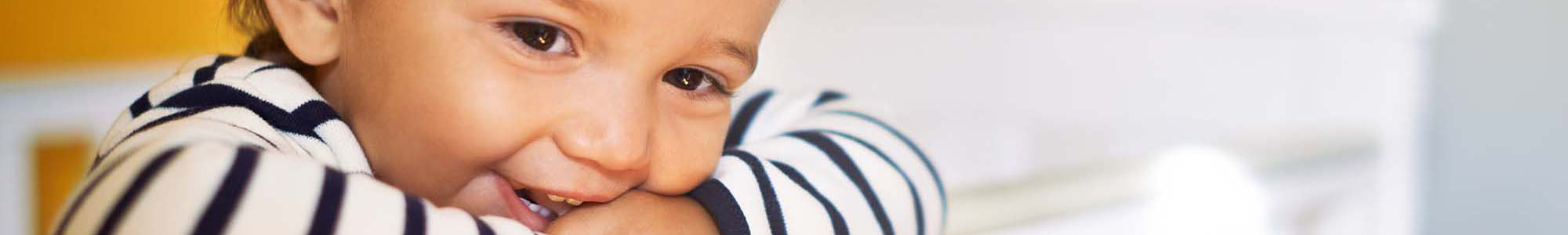 Smiling Child in crib